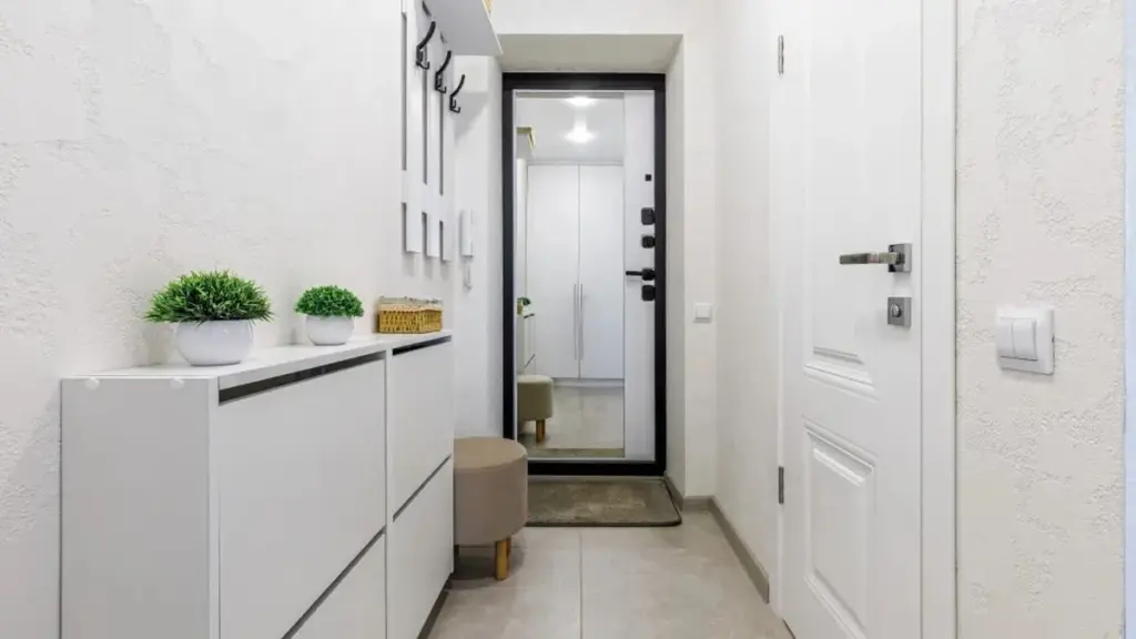 El truco definitivo para un recibidor siempre ordenado: 4 objetos que no pueden faltar